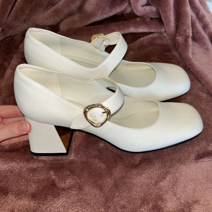 Gorgeous Never-Been-Worn Charles & Keith Mary Janes With 2.75” Chunky Heels. In Perfect Condition And Genuinely The Cutest Shoes I’ve Ever Tried On, But They Fit Way More Like A 10 Than Like An 11 Which They’re Listed As Online :’) Gold Buckles And Mirrored Gold Detail On The Front Of The Heels White Heels With Buckle Closure For Office, White Mary Jane Heels For Formal Occasions, Formal White Heels With Buckle Closure, White Mary Jane Heels Medium Width, White Mary Jane Heels With Buckle Closure, White Ankle Strap Heels For Office, Rocky Horror Picture Show Costume, White Mary Janes, Charles Keith Shoes