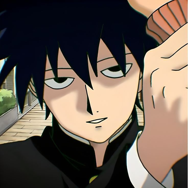 an anime character with black hair holding his hand up to his ear and looking at the camera