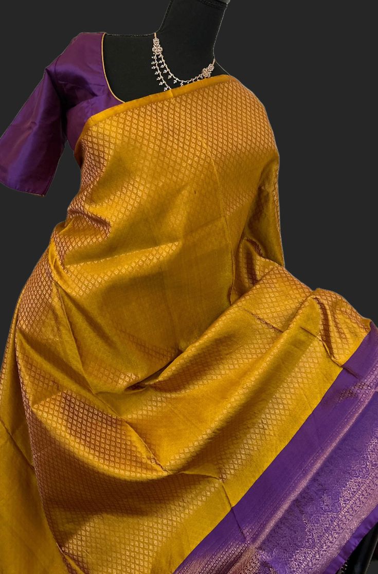 One of the unique combinations- mustard purple stitchedblouse . hand embroidered blouse -36 goes up to 42 inches   DETAILS AND CARE Color mustard lavender   Weight : 600 - 800 grams Length : 5.5 m saree + 0.7 m blouse  Width : 48 Inches Fabric : soft silk  Craft Description : soft silk , Kanjeevaram Wash Care : Dry Wash Only Shipping Time : 5 - 7 Working days We Ship Worldwide SHIPPING AND RETURNS Shipping Policy : Shipping days as mentioned above, subject to changes based on the government regulations around the prevailing pandemic situation.  Return Policy :   We have a comprehensive returns policy , kindly refer to our policy section to know more . DISCLAIMER Colour : There can be a slight variance in the colours of the products on our site from the actual ones. This is attributed to th Festive Yellow Silk Blouse Piece, Semi-stitched Silk Yellow Blouse Piece, Silk Yellow Blouse Piece With Cutdana, Yellow Semi-stitched Silk Blouse Piece, Yellow Silk Blouse Piece For Diwali, Traditional Yellow Blouse With Zari Weaving, Yellow Bollywood Style Blouse In Tussar Silk, Festive Yellow Tussar Silk Blouse Piece, Elegant Yellow Tussar Silk Blouse Piece