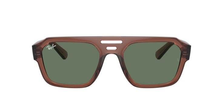 Ray-Ban Corrigan Bio-Based sunglasses redefine the boundaries of style and sustainability. The irregular shape, combined with a polished finish, gives these glasses a unique and modern look. The transparent brown acetate frame is complemented by dark green lenses, adding a touch of color to your look. These shades are not only stylish but also eco-friendly, made from 50% bio-based materials. Embrace the future while being fashion-forward with these one-of-a-kind glasses. Modern Brown Shield Sunglasses With Square Frame, Modern Brown Square Frame Shield Sunglasses, Brown Tinted Glass Aviator Sunglasses, Brown Shield Sunglasses With Gradient Lenses, Modern Brown Glass Shield Sunglasses, Modern Brown Aviator Sunglasses With Anti-reflective Coating, Modern Brown Aviator Sunglasses With Square Frame, Modern Brown Shield Sunglasses With Gradient Lenses, Brown Anti-reflective Shield Sunglasses