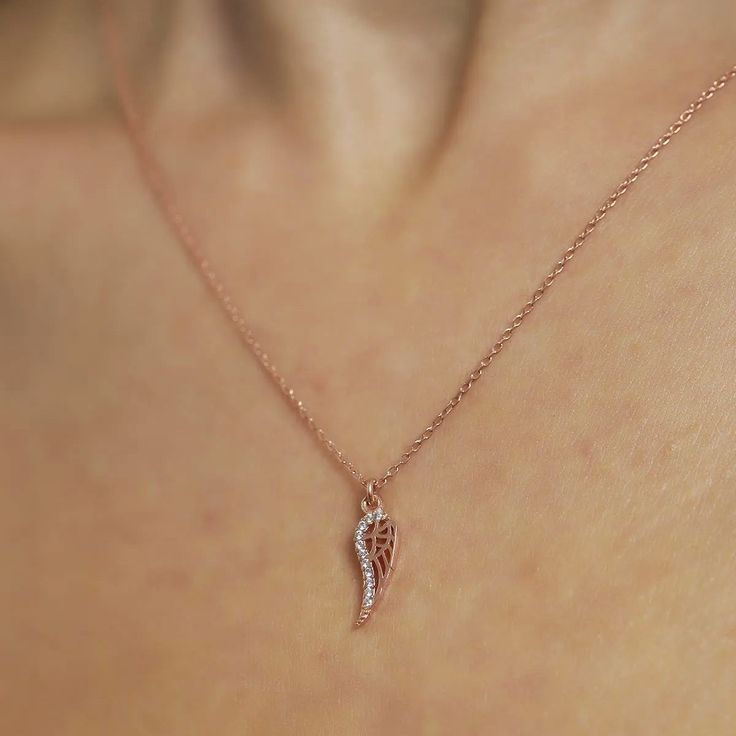 The symbolic Wing Charm Necklace is the ideal present for a loved one or for yourself. You will be charmed by this necklace and it will be a wonderful addition to your collection of designer accessories. Metal: 925 sterling silver Coating: 18k gold Pendant: 3.2 x 1.0 cm (1.25" x 0.4") Stones: cubic zirconia Chain style: cable link Chain length: 40 cm + 5 cm extender (16" + 2") Hypoallergenic: nickel-free materials used therefore suitable for those with metal allergies Designer Accessories, Silver Gifts, Gift For Friend, Necklace Sterling Silver, Chain Ring, Chain Earrings, Gold Pearl, 925 Sterling Silver Jewelry, Chain Styles