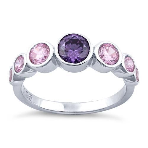 Top of ring height: 6.2mm

Band width: 2.6mm

Shank width: 2.2mm



Stone material: pink & purple cubic zirconia

Center stone size: 5mm

Stone shape: round

Center stone carat weight: 0.46 ct.

Total number of CZ stones: 7

Stone setting: bezel setting



Metal: 925 sterling silver

Plating: rhodium plated

Finish: high polish Pink Diamond Ring With Birthstone In Round Shape, Pink Diamond Ring With Birthstone, Pink Diamond Birthstone Ring, Amethyst Ring With Cubic Zirconia Accent Stones, Cubic Zirconia Gemstone Stackable Rings, Stackable Cubic Zirconia Rings With Accent Stones, Pink Amethyst Ring With Accent Stones For Promise, Round Cubic Zirconia Stackable Rings With Gemstone, Cubic Zirconia Birthstone Ring With Round Band