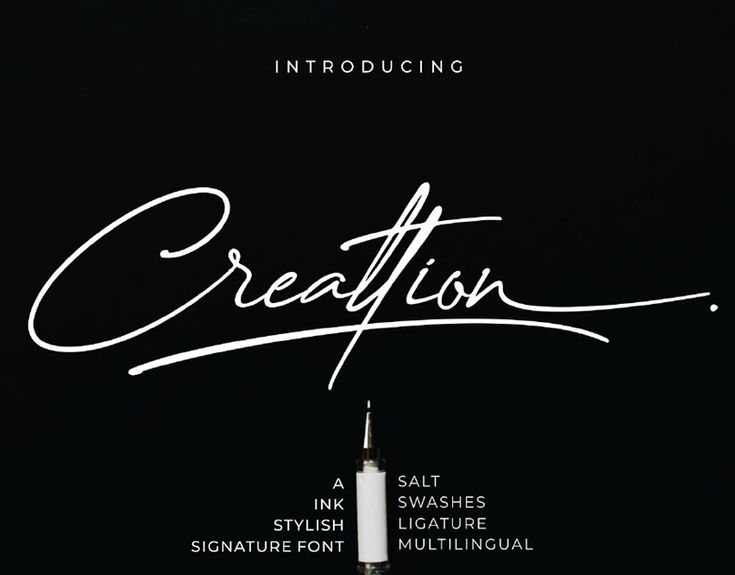 an ink pen with the words creation written in cursive writing on top of it