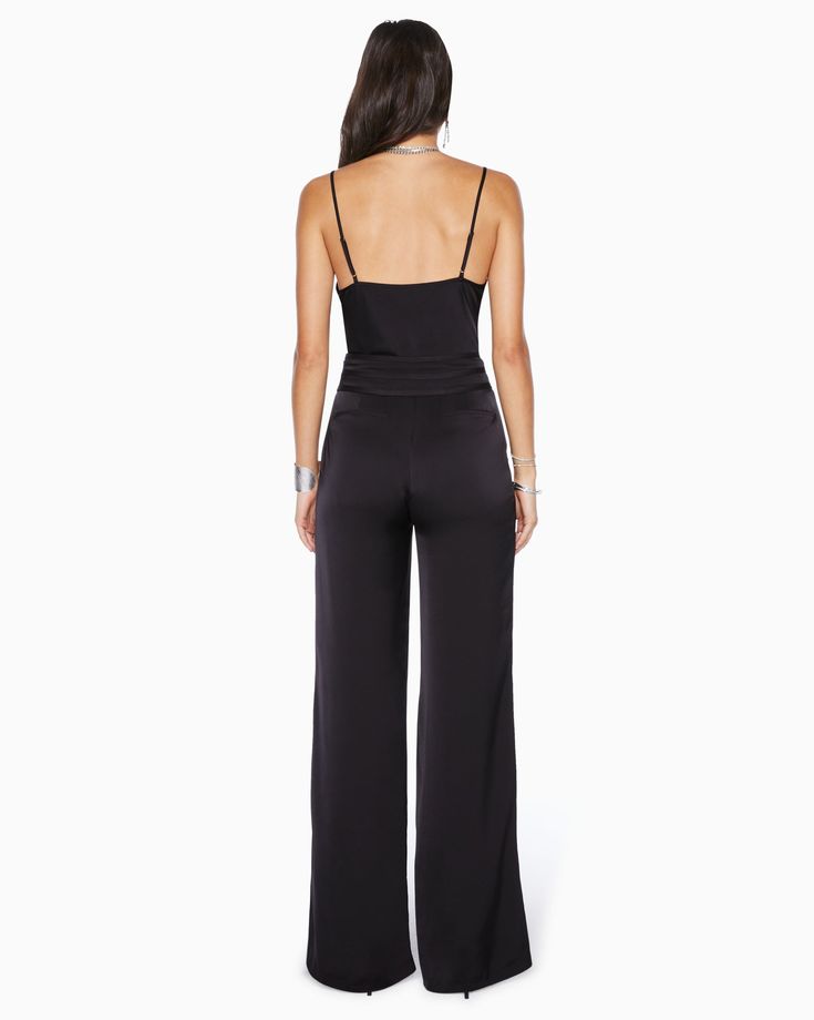 We created the must-have silky, wide leg pant in the perfect colors of the fall season. Meet the Joss Wide Leg Pant - a high waisted number, made in our satin charmeuse fabric, that holds you in and lets you breathe. Pair it with any of our silky classics for a striking look. Shop the look: Abigail Cowl Neck Tank Top Satin Charmeuse Model is wearing size 2 Model Measurements: Height 5'10" / Bust 34" / Waist 24" / Hips 35" This style runs big, we suggest sizing down. Elegant Silk Bottoms For Date Night, High-waisted Silk Wide Leg Pants For Evening, Silk High-waisted Wide Leg Pants For Evening, Silk High-waisted Wide Leg Evening Pants, Chic Silk Pants For Night Out, Sleek Silk High-waisted Wide Leg Pants, Sleek Satin Pants For Evening, Chic Silk Wide-leg Bottoms, Chic Satin Wide Leg Pants In Solid Color