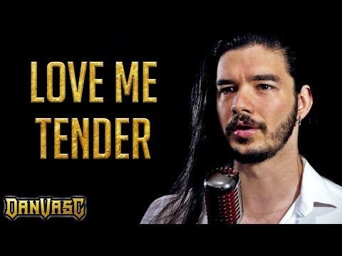 a man with long hair holding a microphone in front of the words love me tender