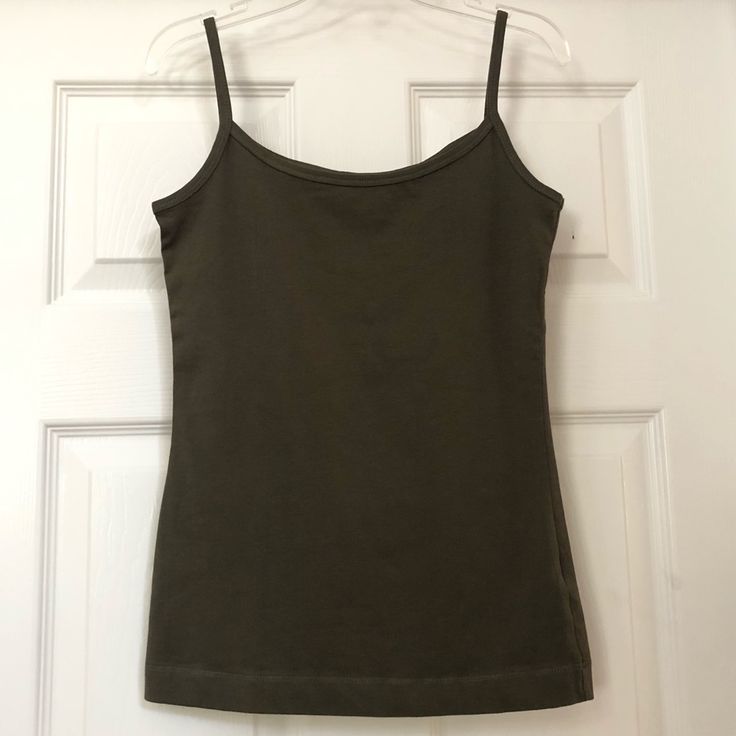 New H&M L.O.G.G. Spaghetti Strap Olive Green Tank Top Cami. Size Small Olive Green Color. Label Of Graded Goods Made By H&M. Authentic Construction For Timeless Apparel. Features: Scoop Neckline Sleeveless Fitted Stretchable 94% Cotton & 6% Spandex. Made In Bangladesh. Brand New In Excellent Condition. From A Clean, Smoke Free And Pet Free Home. Also Available In Pink, Purple Or Burgundy Colors; Sold Separately. Black Mock Neck Top, Olive Green Tank Top, Olive Tank Top, Green Cami, Girly Clothes, White Crop Top Tank, Black Corset Top, Black Mock Neck, Long Tank Tops