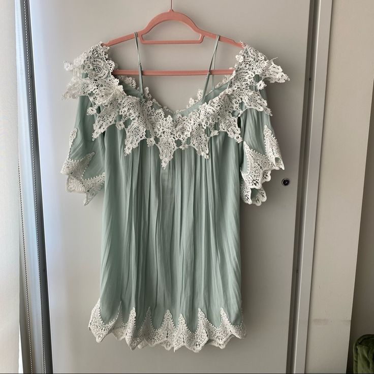 Nwt. Gorgeous Dress But It Is See-Through. Would Be Perfect As A Swim Coverup Or Could Wear As A Dress With A Slip Underneath. Color Is Mint Green And White Flowy V-neck Sundress With Lace Trim, V-neck Sundress With Lace Trim For Day Out, V-neck Sundress With Lace Trim For Spring, Flowy Cotton Mini Dress With Lace Trim, Casual Off-shoulder Lace Dress, Summer Tops With Lace Trim And Mini Length, Flowy Summer Mini Dress With Lace Trim, Forever 21 Green Spring Dress, Spring Daytime Mini Dress With Lace Trim