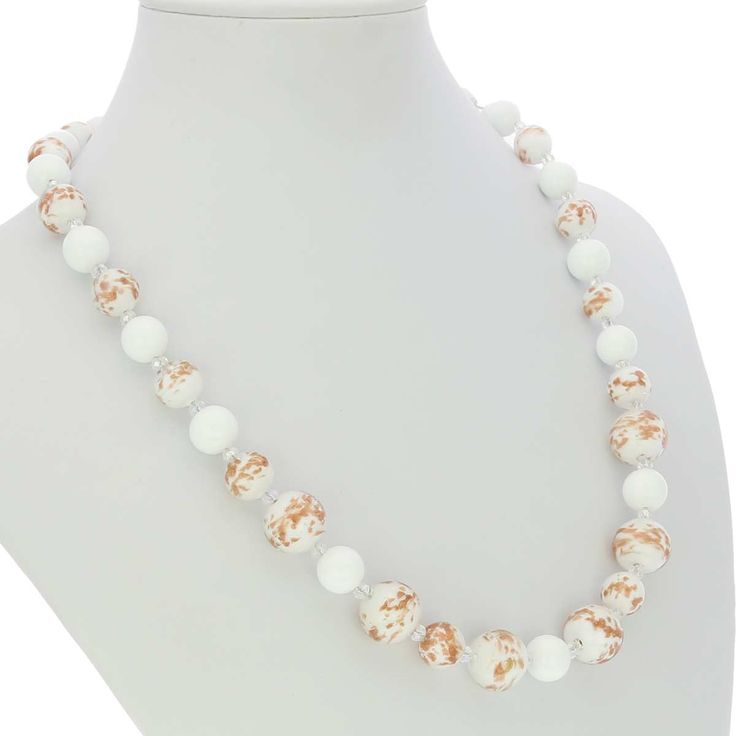 This gorgeous Venetian necklace in rich bright white color created by famous Murano glass masters in their tradition of artistic elegance and exquisite workmanship. It is is 100% hand-crafted using centuries-old Murano glass techniques. The necklace features beautiful rich color, and a combination of round beads of varying sizes infused with avventurina sparkles. Its festive bright look will light up your day and your mood. This Murano necklace is a must-have for any woman who values elegance, c Elegant White Round Crystal Necklace, Elegant White Round Crystal Necklaces, Elegant Round Glass Crystal Necklaces, Formal White Round Bead Necklaces, White Glass Beaded Necklaces For Gifts, White Round Single Strand Jewelry, White Single Strand Round Jewelry, Elegant White Crystal Necklace For Formal Occasions, Elegant White Round Beaded Necklaces