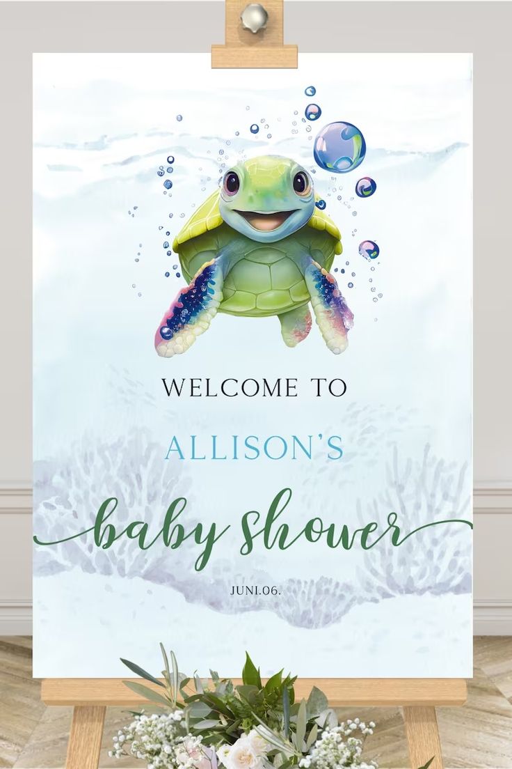 a welcome sign for a baby shower with an image of a turtle