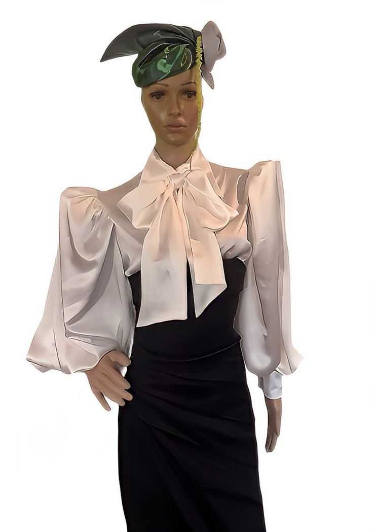 PRODUCT DETAILS  - Semi- fitted blouse. - Satin top with oversized spread collar. - Long ( 25 inch - 63.5 cm Long without cuffs) puffy sleeves gathered at shoulder and cuff sleeves.  -  Button- fastening cuffs - 3.5 inch/9 cm wide ( with 2 satin covered buttons for each cuff) - Centre-front button fastening with satin covered buttons. - Self Neck Tie 6 inches/ 15 cm wide and 67 inch/ 170 cm long  - Shirt Length, measured from shoulder height to hem - 27 inch ( 68cm). - Shirttail hem. - Fabric- Satin Polyeste. Machine wash. Line dry.   Only basic body measurements are needed to your pattern type and size. Remember to wear proper undergarments and shoes when measuring. Also, make sure the tape measure is held snugly and firmly (not tightly) against your body and is always parallel to the flo Elegant Long Sleeve Stretch Blouse, Chic Fitted Puff Sleeve Blouse, Classic Fitted Padded Blouse, Formal Long Sleeve Stretch Blouse, Chic Fitted Blouse With Puff Sleeves, Formal Stretch Long Sleeve Blouse, Fitted Evening Tops With Blouson Sleeves, Formal Stretch Blouse For Fall, Stretch Formal Blouse For Fall