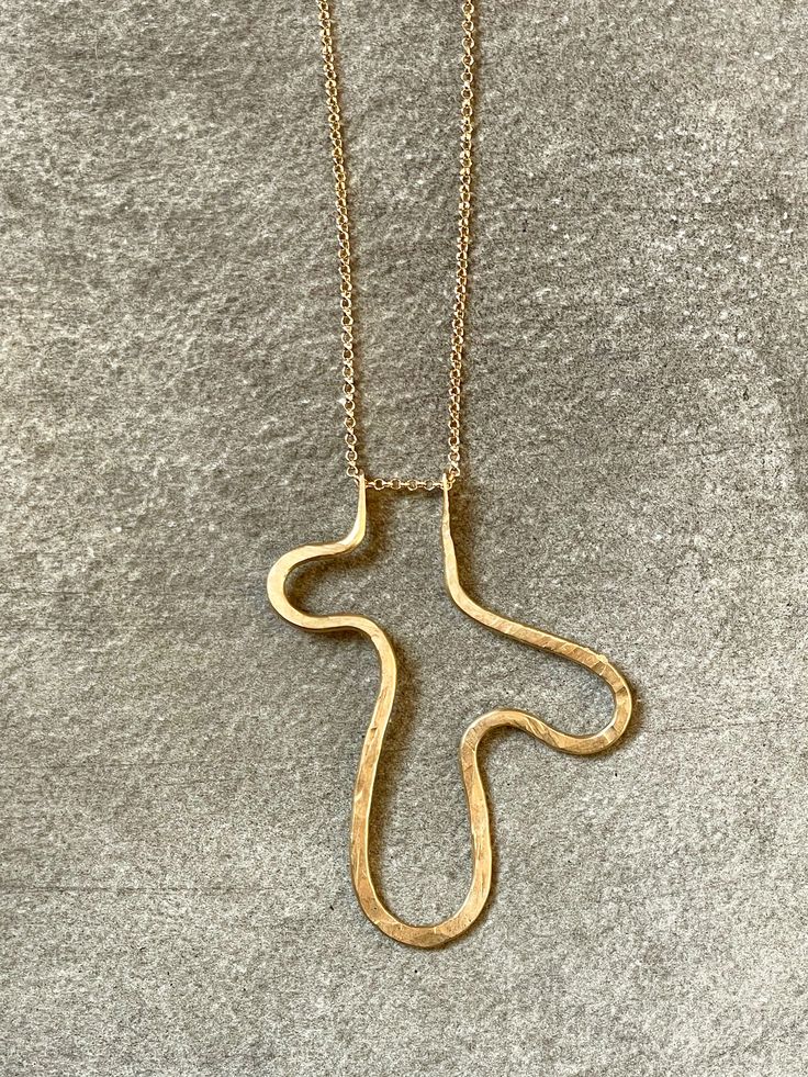 Cat Luck of Collarbone Jewelry works between her studio in Pittsburgh and a shared studio in NYC. Inspired by the raw aesthetics of the natural world, Luck is visual storyteller, using the alchemy of pure and mixed metals to create striking pieces that speak volumes. "Pinched Squiggle" hammered brass pendant a 30" 14K gold-filled chain. Pendant measures 2 1/4" long Cheap Handmade Brass Necklaces, Wire Chain Links, Brass Jewelry Design, Hammered Metal Jewelry, Brass Pendant Necklace, Hammered Jewelry, Metalsmithing Jewelry, Modernist Jewelry, Jewelry Words