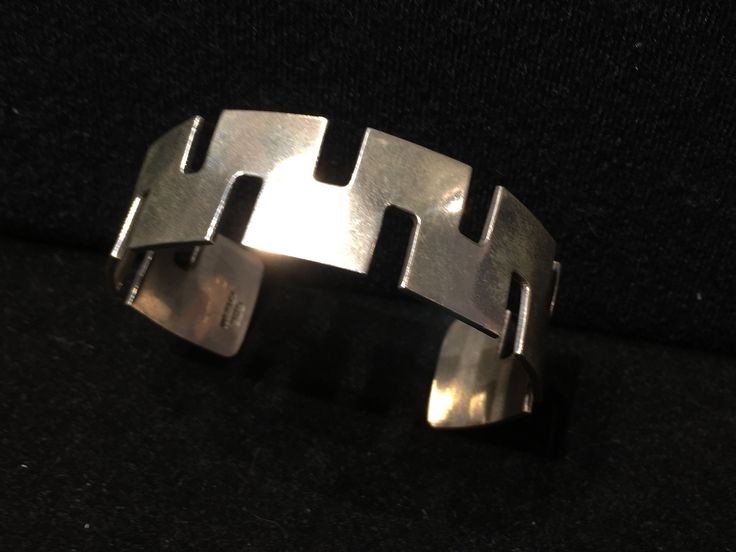 "Old Mexican Sterling Silver abstract modern cuff bracelet with attractive MCM style sculptural cut out design. Mexico & 925 stamps 13/16\" wide 5.75\" interior circumference plus 1 3/8\" flexibile gap 37g 505R - This stunning piece is coming from an exciting relationship with a well known & popular Santa Fe, NM, jewelry gallery. I will be listing many exquisite pieces, some at lower prices than they are offered at in the gallery! The owner is a certified Gemologist who has been dealing Modernist Cuff Bracelet With Polished Finish, Modernist Polished Cuff Bracelet, Modernist Sterling Silver Bangle, Contemporary Sterling Silver Bangle Bracelet, Modernist Sterling Silver Bracelet, Modern Sterling Silver Cuff Bracelet, Modern Sterling Silver Cuff Bracelet For Formal Occasions, Pueblo Native Americans, Old Mexico