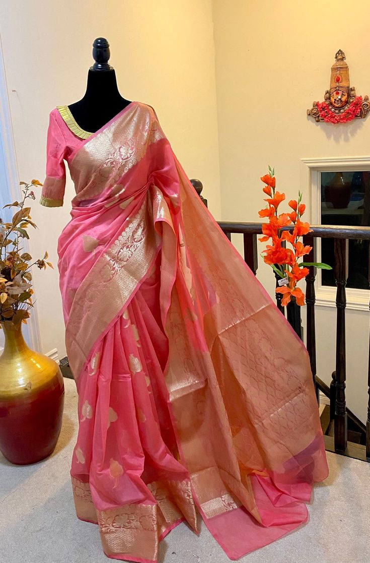 Beautiful Soft Banarasi kora organza saree  with beautiful color soft and easy to drape   paired up with ready to wear pretty designer blouse fits to 32 to 46 size saree is done with fall and pico ready to wear ! ideal for parties and occasions chek the video and chek the pictures for blouse design Elegant Organza Blouse For Navratri, Elegant Pink Dola Silk Saree, Festive Organza Saree Blouse, Unstitched Bollywood Blouse Piece In Organza, Designer Unstitched Organza Blouse For Traditional Wear, Designer Unstitched Organza Blouse, Bollywood Unstitched Organza Blouse Piece, Bollywood Style Unstitched Organza Blouse Piece, Diwali Blouse In Organza With Traditional Drape