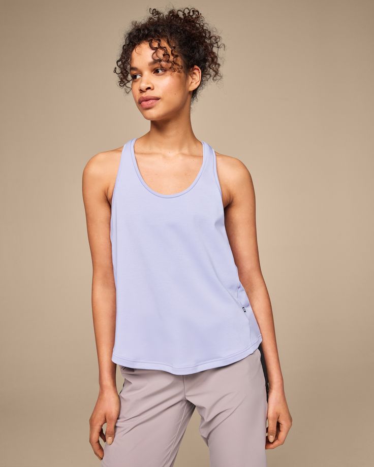 From park runs to practicing your yoga inversions, this performance-ready tank top is for working out (and chilling out). Soft, lightweight and never clingy, the Focus Tank helps you feel your best whatever your workout. For sessions that call for a wide range of motion and flexibility, this smart tank delivers the goods. Feel-good and quick-drying fabric keeps your mind focused on your workout – without thinking twice about sweat. This is our sleeveless super power. Our sweat-wicking secret to Stretch Functional Yoga Tank Top, Functional Stretch Tank Top For Yoga, Yoga Moisture-wicking 4-way Stretch Tank Top, Yoga Tank Top With Moisture-wicking And 4-way Stretch, Yoga Tank Top With 4-way Stretch And Mesh Back, Yoga Tank Top With Mesh Back And 4-way Stretch, Racerback Tank Top For Yoga With 4-way Stretch, Mesh Back Tank Top With 4-way Stretch For Yoga, Compressive Go-dry Tank Top For Yoga