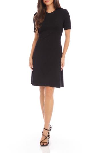 This classic stretch-jersey dress earns its keep in your wardrobe with its endless versatility and easy wear. 36 3/8" length (size MP) Jewel neck Short sleeves Unlined 90% rayon, 10% spandex Dry clean or machine wash, line dry Imported Solid Short Sleeve Midi Dress In Elastane, Solid Short Sleeve Midi Dress, Solid Color Short Sleeve Midi Dress, Classic Stretch Short Sleeve Midi Dress, Short Sleeve Stretch Midi Dress, Black A-line Midi Dress In Elastane, Classic Stretch Midi Dress, Classic Stretch Mini Dress, Stretch Elastane Midi Dress With Short Sleeves