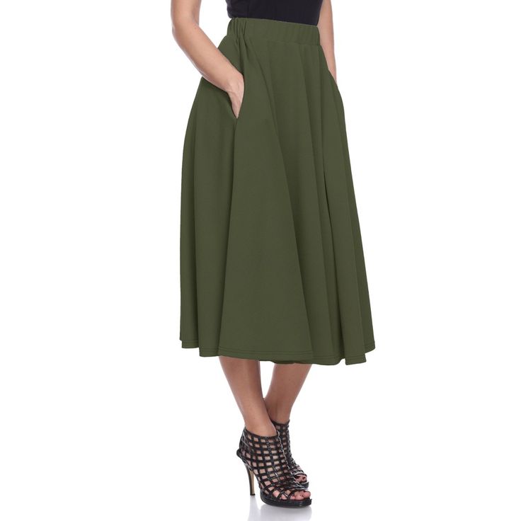 Strut or twirl with confidence in this light and breezy flared skirt. Perfect for keeping cool on a hot summer's day or for adding a touch of style whether you're off to work or a night on the town, this polyester and spandex skirt is as versatile as it is alluring. Simply hand wash your skirt to keep it looking new longer. Flared Midi Skirt, Midi Skirt With Pockets, Midi Flare Skirt, Floral Midi Skirt, Skirt With Pockets, Midi Skirts, White Mark, Flared Skirt, Skirts With Pockets