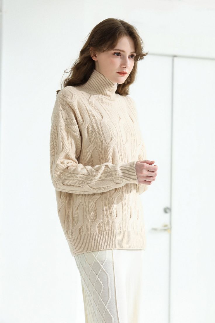 Final Sale Please note that this is a final sale item. This item is not eligible for returns, exchanges, or any further reductions in price. Fabric: 100% Wool Color: Beige Care: Hand wash or dry clean Round neckline, dropped shoulders and long sleeves. Cable knit and ribbed trims. Slips on. When building a transeasonal wardrobe that has lasting appeal, a cable knit jumper is necessary. This piece is constructed from a pure wool into a relaxed silhouette. Model is 173cm/5'8" tall and wearing a si Beige Long Sleeve Turtleneck With Ribbed Collar, Beige Long Sleeve Sweater With Ribbed Collar, Beige Ribbed Turtleneck For Winter, Cream Long Sleeve Turtleneck For Winter, Winter Beige Sweater With Ribbed Collar, Beige Ribbed Collar Sweater For Winter, Cream Turtleneck With Ribbed Collar For Fall, Beige Sweater With Ribbed Collar For Winter, Cream Long Sleeve Turtleneck For Fall