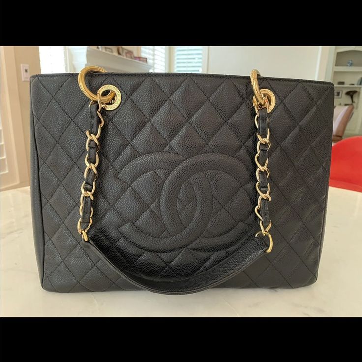 Chanel Handbag Authentic Vintage, Rarely Used. Large (13.5”Wx9.5”Hx4”D). 3 Compartments, One With Zipper. Comes With Original Certificate, Documentation, Cleaning Cloth (Unused), And Protective Storage Cover. Luxury Large Shoulder Bag With Top Carry Handle, Large Luxury Bags With Removable Pouch, Luxury Large Shoulder Bag With Removable Pouch, High-end Large Shoulder Bag For Everyday Use, Large Designer Shoulder Bag With Handle Drop, Luxury Large Bags With Detachable Handle, Luxury Large Bag With Detachable Handle, High-end Everyday Luxury Tote Shoulder Bag, Elegant Large Shoulder Bag With Top Carry Handle