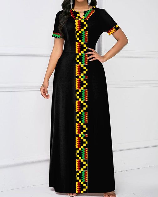 Black Bohemian A-line Dress, Black A-line Bohemian Dress, Casual Colorful Patterned Maxi Dress, Casual A-line Dress With Geometric Pattern, Black Patchwork Dress For Vacation, Black Dress With Colorful Pattern, Casual Multicolor Geometric Pattern Maxi Dress, Casual Multicolor Maxi Dress With Geometric Pattern, Green Patchwork Maxi Dress