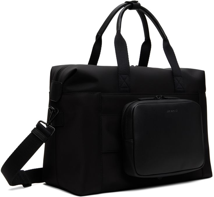 Water- and scratch-resistant nylon twill duffle bag in black. · QuickSnap™ Modular Kit System · Buffed faux-leather trim throughout · Press-stud tab at rolled carry handles · Adjustable and detachable webbing shoulder strap · Patch pocket and luggage strap at face · Logo patch at back face · Zip pocket at back face · Bumper pads at base · Two-way zip closure · Zip pocket and patch pockets at interior · Laptop compartment · Twill lining · H11 x W16.5 x D7.5 Detachable water- and scratch-resistant Black Shoulder Bag With Leather Handles For Commuting, Black Travel Bag For Commuting, Black Travel Satchel With Leather Trim, Black Satchel With Leather Trim For Travel, Black Leather Trim Satchel For Travel, Black Travel Bags With Leather Trim, Black Duffle Bag With Leather Trim For On-the-go, Black Coated Canvas Satchel For Travel, Black Duffle Bag With Leather Handles For On-the-go