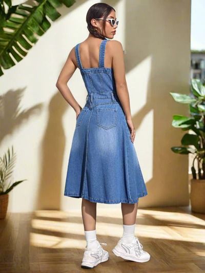 Denim Spaghetti Strap Dress: Effortless Style for Every Occasion Casual Summer Suspender Dress With Pockets, Casual Suspender Dress With Pockets For Summer, Casual Suspender Dress With Spaghetti Straps, Blue Casual Suspender Dress, Casual Blue Suspender Dress, Casual Fitted Suspender Dress With Adjustable Straps, Casual Fitted Suspender Dress For Spring, Casual Spring Suspender Dress For Day Out, Casual Midi-length Suspender Dress With Adjustable Straps