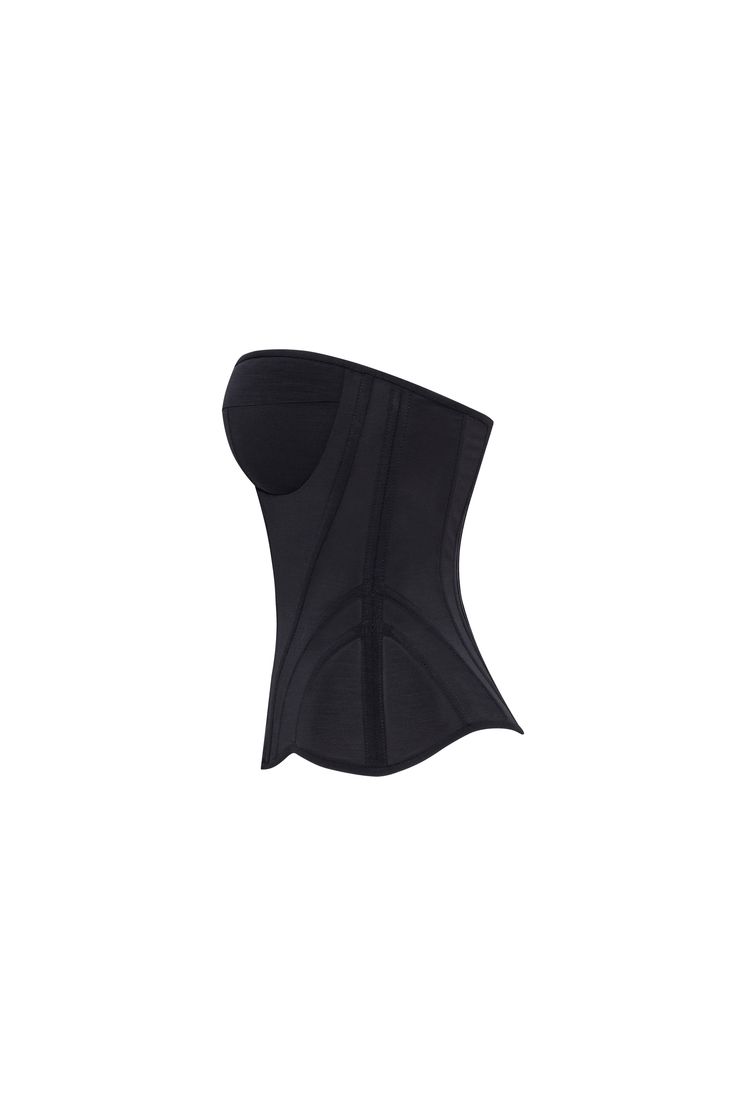 Stylish heart-shaped black fitted corset, designed with structured boning and discreet zip closure for a seamless fit. The corset offers both support and shape while enhancing your natural curves. Its sleek, minimalist design pairs beautifully with danceable ruched flower appliques mini skirt, creating a dynamic contrast between the structured top and the playful, full-bodied skirt. Details: Material: Combined Fabric Fabric composition: 92% Polyester; 8% Elastan Sleeve style: Sleeveless Silhouet Sculpting Shapewear Corset With Built-in Bra, Black Underwire Corset With Built-in Bra, Black Strapless Shapewear With Built-in Bra, Black Stretch Overbust Corset Dress, Black Stretch Corset Belt With Corset Back, Black Stretch Corset Dress Overbust, Elegant Fitted Shapewear With Boning, Black Overbust Bodice With Corset Back, Fitted Corset With Medium Bust Support For Night Out