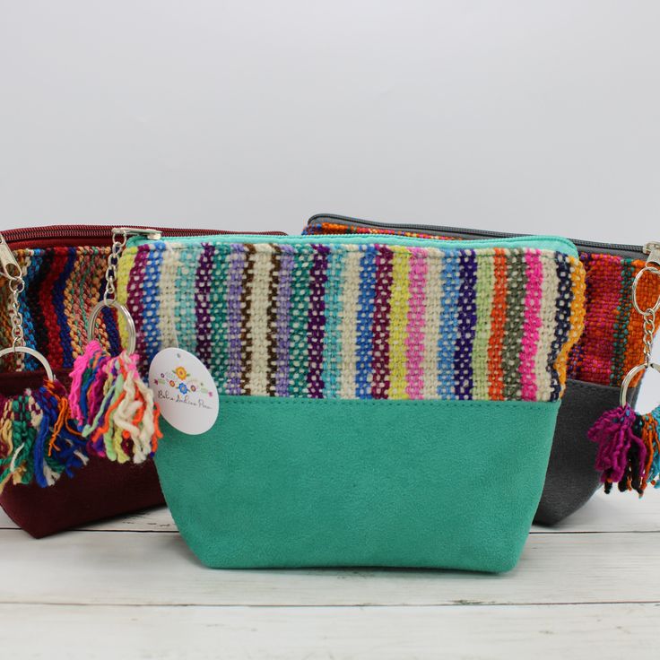 Size Dimensions: Main Bag approx: 8 inches (L) x 6 inches (H) x 2 inches (W) Materials: Nubuck Leather, Sheep Wool. Zipper Lined Say hello to our Wool Clutch, a true gem crafted by skilled Indigenous weavers from Cusco, Peru. This chic accessory is not just like a makeup bag; it's a statement piece that adds a touch of artisan beauty to your everyday routine. Handwoven using traditional Quechua techniques and locally-sourced wool, this clutch is your new go-to for style and sustainability. 🌿✨ -Each clutch supports Indigenous artisans and helps preserve traditional weaving    techniques. -Perfectly sized to fit in your handbag or carry alone as a chic clutch. -Bag features unique patterns and colors, making it a true piece of art. -Feel good knowing your purchase supports fair trade practi Bohemian Cosmetic Bag With Zipper, Rectangular Shape, Bohemian Cosmetic Bag, Rectangular Zipper Pouch, Bohemian Rectangular Cosmetic Bag With Zipper, Bohemian Style Rectangular Cosmetic Bag With Zipper, Bohemian Rectangular Cosmetic Bag For Daily Use, Bohemian Cosmetic Bag For Daily Use, Artisan Multicolor Rectangular Clutch, Multicolor Pouch Coin Purse For Daily Use, Bohemian Cosmetic Bag With Zipper For Everyday Use