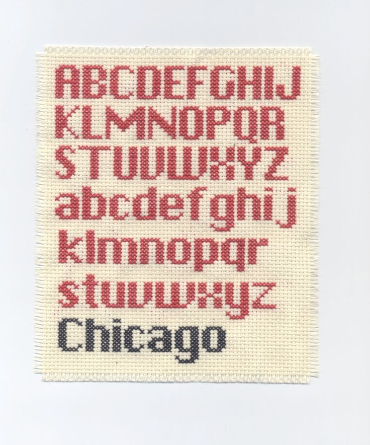 a cross stitch pattern with the words chicago in red and black on white fabric,