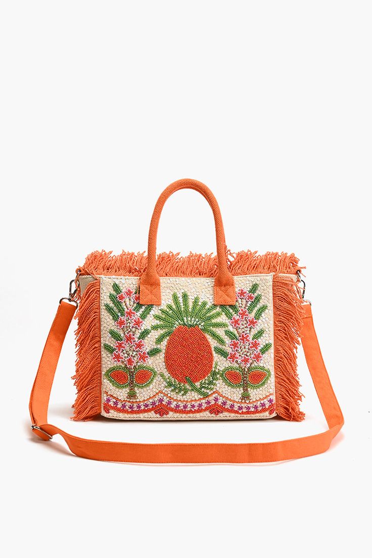 Fringed Mini tote bag Fully Embellished Front Two rounded top handles Detachable shoulder strap Open top with magnetic closure & fringed edge details Inside slip pocket and zip pocket with Fully lined interiors Size: 14" x 9" x 3.5" Get ready to add a pop of playful charm to your ensemble with our Fringe Fiesta Pin Spring Rectangular Shoulder Bag With Fringe, Rectangular Tassel Bags For Spring, Trendy Fringe Shoulder Bag For Spring, Trendy Fringe Bags For Spring, Spring Tote Bags With Tassels, Trendy Rectangular Bag With Fringe, Spring Travel Bags With Fringe, Trendy Satchel Bag With Fringe, Trendy Fringed Satchel Bag