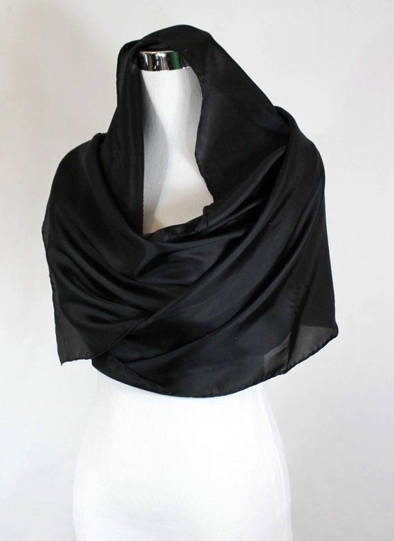 Black silk shawl, Solid Black formal scarf, 14"x72" scarf, Solid black silk scarf, ready to ship, habotai silk scarf, black silk scarf.Product information:Designer - Mary Jane DavidsonMaterial- 100 % natural 8mm Habotai silkColor - Solid BlackSize - 14"x72" slight shrinkage may occur from steamingPackage - Envelope or gift packageEach scarf is unique and it is a true piece of wearable art, no one else is going to have the same scarf like you! Each scarf is painted by me one at a time and so slig Silk Shawl Scarves For Evening, Classic Silk Scarves For Evening, Classic Black Silk Scarves, Classic Silk Shawl For Formal Occasions, Elegant Black Silk Scarves, Classic Silk Evening Scarf, Elegant Black Silk Scarf For Evening, Silk Shawl For Evening, Classic Black Silk Scarf