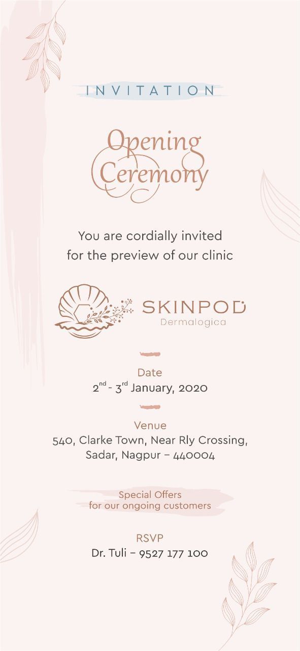 an open ceremony card with flowers and leaves