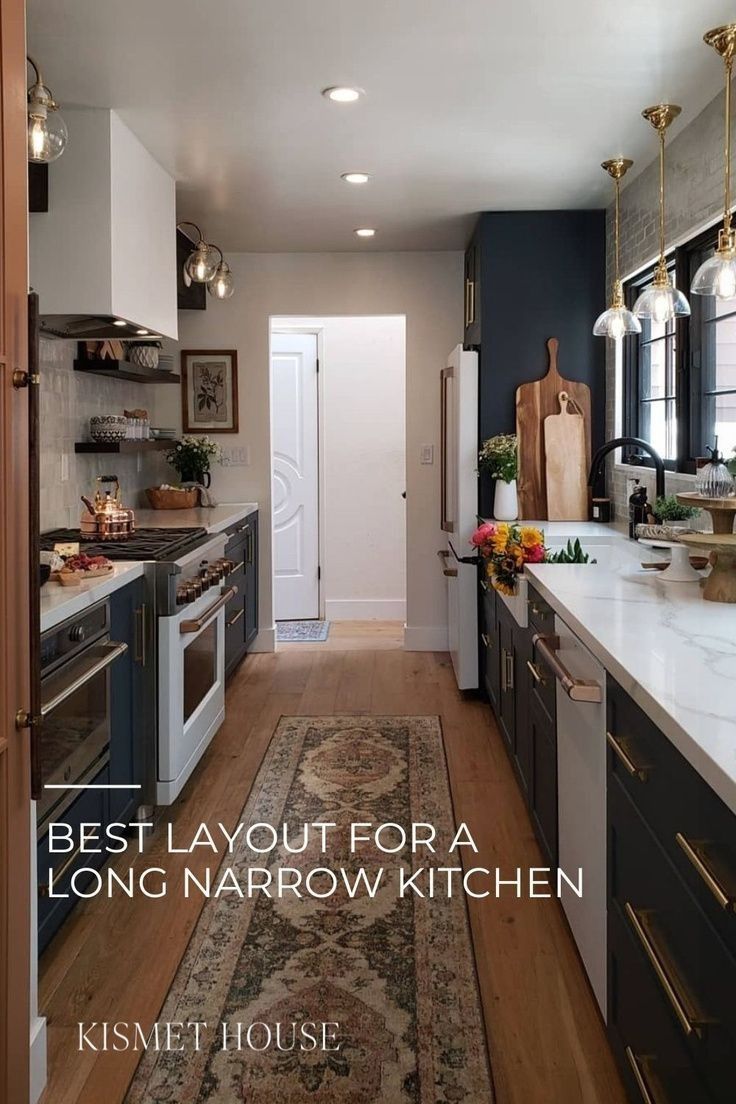 a long narrow kitchen with an area rug on the floor in front of the sink