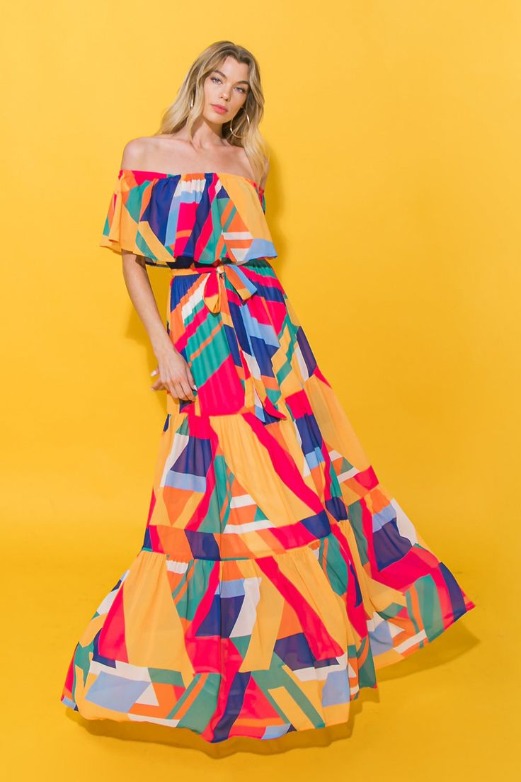 A printed woven maxi dress featuring off shoulder neckline, elasticized waist, self sash tie and tiered skirtDetailsSelf: 100% PolyesterLining: 100% PolyesterSize & Fit- Model is 5`8" And Wearing Size Small- Measurements Taken From Size Small- Approx. Length: 50.5" Summer Off-shoulder Lined Maxi Dress, Off-shoulder Lined Maxi Dress For Summer, Summer Off-shoulder Flowy Dress, Off-shoulder Flowy Summer Dress, Multicolor Summer Midi Dress For Casual Occasions, Multicolor Off-shoulder Midi Dress For Vacation, Chic Beach Dresses With Vibrant Print, Chic Vibrant Print Beach Dress, Chic Multicolor Flowy Maxi Dress