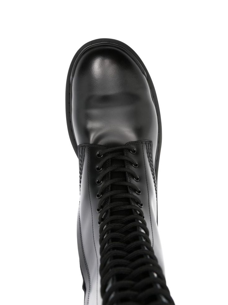 Find BALENCIAGA Strike Lace-up Leather Boots on Editorialist. black calf leather embossed logo to the front and to the rear round toe front lace-up fastening side zip fastening pull-tab at the opening knee-high branded leather insole 20mm chunky rubber lug sole We've partnered with Good On You — an independent agency that rates how brands perform in relation to their impact on the planet, people and animals, with a multi-criteria rating simplified to a five points scale. In order to be awarded our conscious label, larger brands need to score a minimum of four out of five ('Good'), while smaller brands must score at least three out of five ('It's a start'). This item comes from a brand rated four out of five ('Good') by Good on You at the time it was added on FARFETCH. Please note, this is Balenciaga Boots, Planet People, Balenciaga Black, Low Block Heels, Lug Sole, Black Leather Boots, Brown Fashion, Embossed Logo, Pull Tab