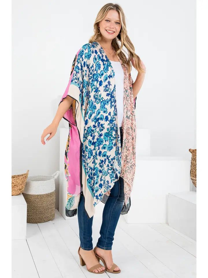 Experience the epitome of casual elegance with our Bohemian Floral Patch Print Kimono. Made from 100% viscose, it provides a soft, comfortable feel, perfect for resort or vacation wear. The missy fit suits a variety of body types, while the floral patch print adds a whimsical touch. Whether you're lounging poolside or exploring a new city, this kimono ensures you do it in style. 100% Viscose Casual Multicolor V-neck Kimono, Casual Patterned Kimono For Beach Cover-up, Casual V-neck Kimono With Boho Print, One Size Pink Kimono For Summer, Casual V-neck Kimono For Loungewear, Casual V-neck Rayon Kimono, Rayon Kimono For Loungewear, Casual Pink Kimono For Beach Season, Multicolor Flowy Casual Kimono