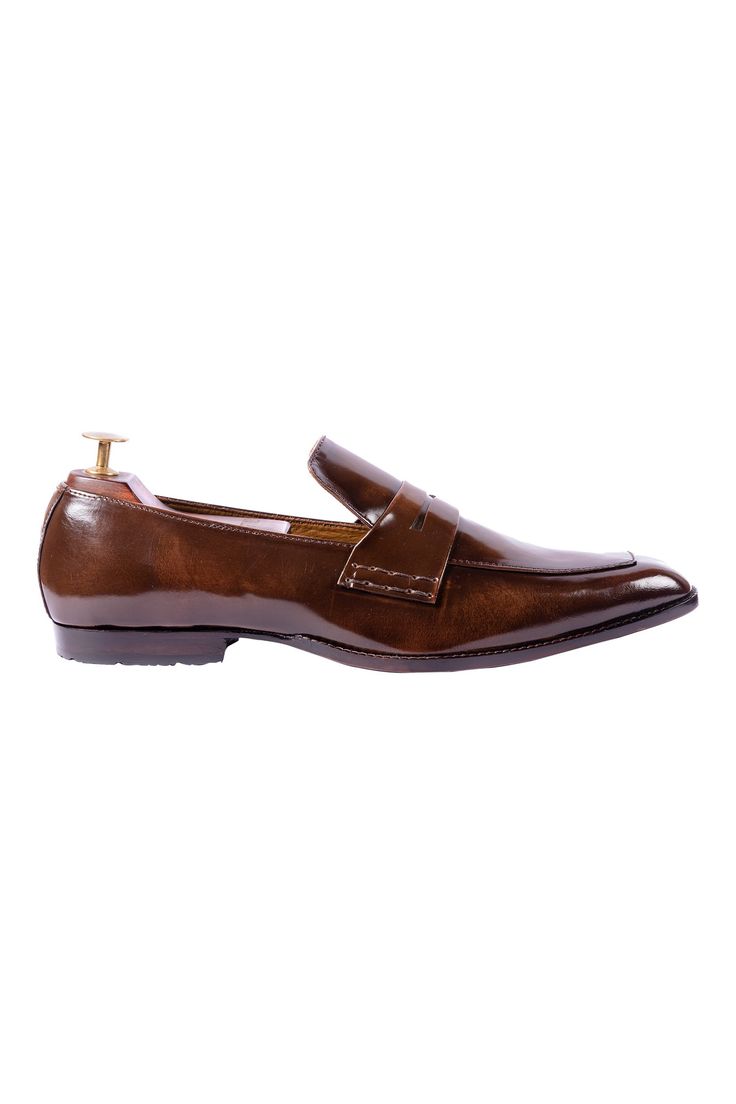 Burnt brown handcrafted leather loafers with cutout strap detail, stack heels and almond toe.

Composition: Leather
Color: Brown
Almond toe
Heel height: Low Top
Stack heels
Cutout strap
Flap detail - Aza Fashions Men Footwear, Loafers Brown, Loafers For Men, Loafers Online, Handcrafted Leather, Stacked Heel, Leather Loafers, Aza Fashion, Loafers Men