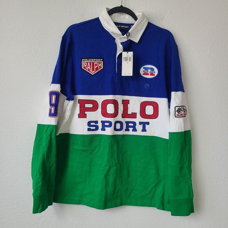 Polo Sport Ralph Lauren 67 Racing Series Long Sleeve Polo Shirt Size L Blue Green White Condition: New With Tags. Sporty Green Collared Tops, Sporty Collared Green Tops, Green Collared Sporty Tops, Long Sleeve Blue Polo Shirt For Spring, Blue Long Sleeve Polo Shirt For Spring, Spring Sports Collared Tops, Navy Sporty Shirt With Polo Collar, Green Sporty Polo Collar Shirt, Sporty Navy Shirt With Polo Collar