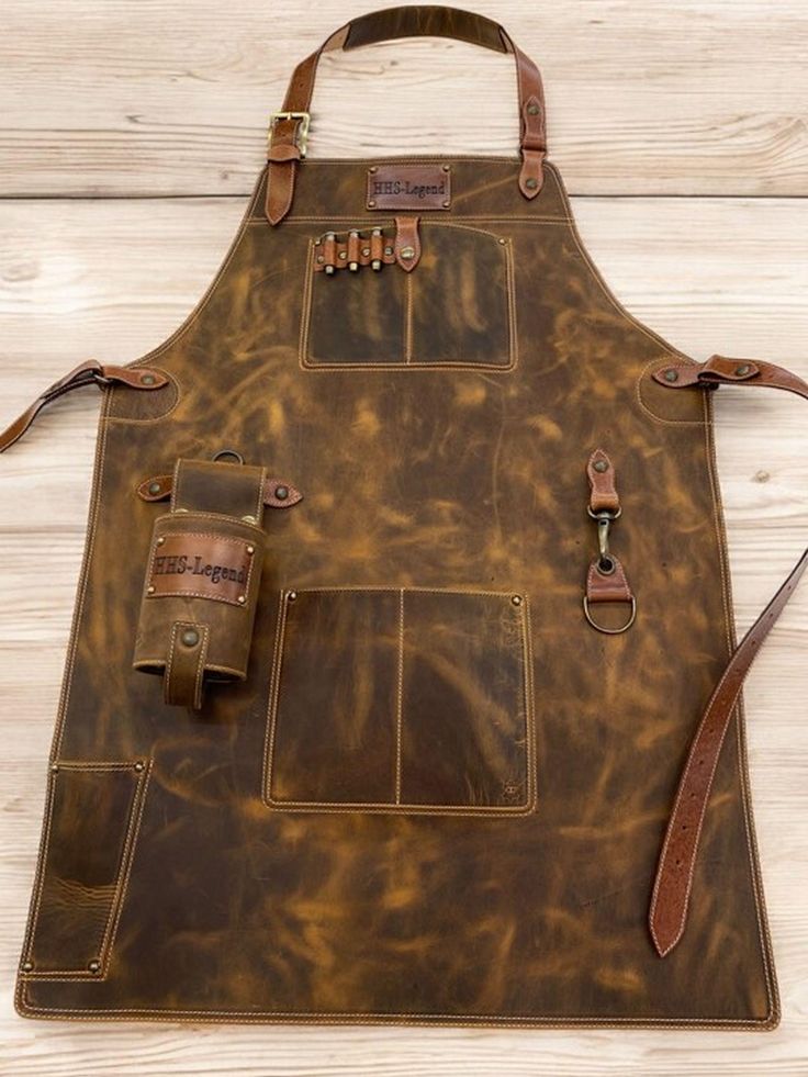 a brown leather apron with two straps on it