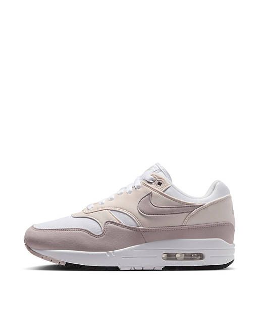 Nike Air Max 1 sneakers in white and pink | ASOS White Leather Sneakers With Air Max Cushioning, Leather Sneakers With Air Max Cushioning And White Sole, White Sole Leather Sneakers With Air Max Cushioning, White Chunky Sneakers With Abzorb Midsole In Athleisure Style, White Leather Sneakers With Air Cushioning, White Athleisure Platform Sneakers With Translucent Outsole, White High-top Sneakers With Air Cushioning For Light Sports, White Athleisure Sneakers With Translucent Outsole, Nike Sneakers With Air Cushioning