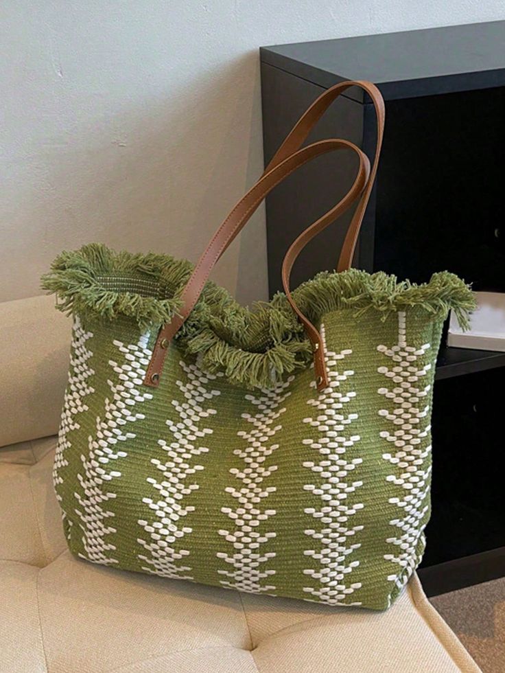 Elevate your beach day style with our Summer Chic Straw Fringed Tote Bag. Made from high-quality straw and featuring playful fringe details, this tote is both fashionable and functional. Perfect for storing your beach essentials, this bag is a must-have for any summer adventure. Color : Green Strap Type : Double Handle Details : Fringe Bag Size : Large Style : Vacation Type : Shoulder Tote Bag Closure Type : Buckle Pattern Type : Colorblock Features : High-capacity Material : Polyester Compositi Trendy Vacation Bag With Fringe, Trendy Fringe Vacation Bag, Trendy Vacation Shoulder Bag With Fringe, Trendy Fringe Shoulder Bag For Vacation, Trendy Crochet Bag With Tassels For Beach, Trendy Beach Bag With Fringe, Trendy Beach Shoulder Bag With Tassels, Trendy Beach Bags With Fringe, Trendy Beach Bags With Tassels