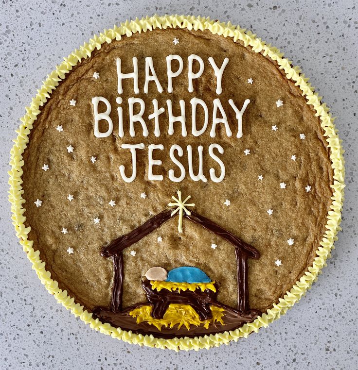 a birthday cake with the words happy birthday jesus written on it