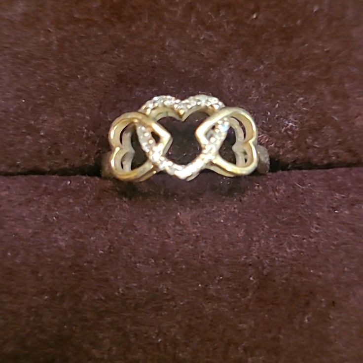 3 Interlocked Heart Promise Ring. Middle Heart Has 1/4 Caret Diamonds. Great Condition, Only Worn 5 Months. Size 4. Heart Promise Rings, Ring Color, 5 Months, Promise Ring, Womens Jewelry Rings, Promise Rings, Size 4, Diamonds, Women Jewelry