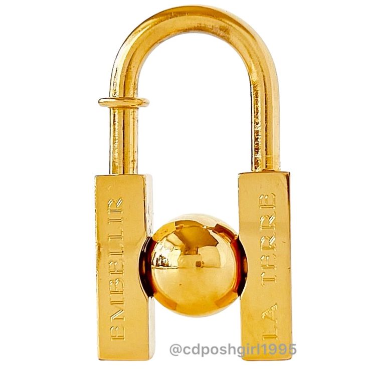 Collectible Limited Edition By Herms In 2001: Authentic Hermes Cadena Padlock Bag Charm / Key Ring, Gold Plated, "L’homme Peut Embellir La Terre". Size (Inch): W 0.8 " H 1.6" Size (Cm) : W 2.1 H 4.0 Cm Preowned In Very Good Condition, Minor Wear. Please Review All The Actual Photos For All Details, Condition, Measurements. Nb: All Actual Pictures Except The 2nd Photo Which Is Only For Reference Comes With An Unbranded Box. Free Authentication By Poshmark On Items Over $500. No Trades. Price As M Hermes Accessories, Key Card Holder, Photographic Lighting, Ring Gold, Key Ring, Key Rings, Gold Color, Gold Rings, Gold Plate