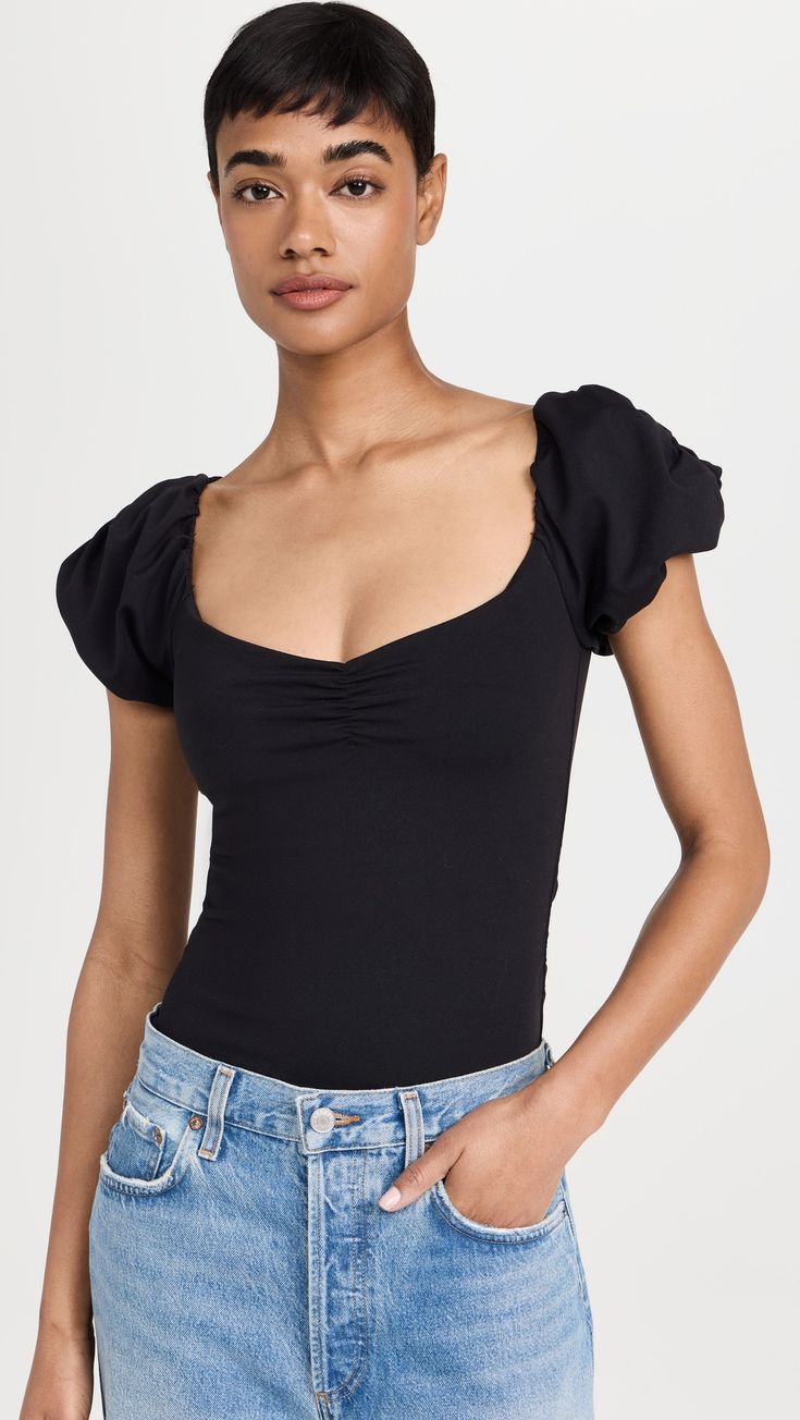 Fast Free Shipping & Free Returns on Free People Bella Thong Bodysuit at Shopbop. Shop new arrivals from Free People at Shopbop.com Stretch Puff Sleeve Tops, Fitted Ruched Puff Sleeve Top, Stretch Short Sleeve Bodysuit For Night Out, Fitted Ruched Top With Puff Sleeves, Fitted Top With Gathered Short Sleeves, Fitted Short Sleeve Tops With Gathered Sleeves, Tops With Gathered Short Sleeves, Stretch Puff Sleeve Top For Night Out, Summer Stretch Puff Sleeve Top With Short Sleeves