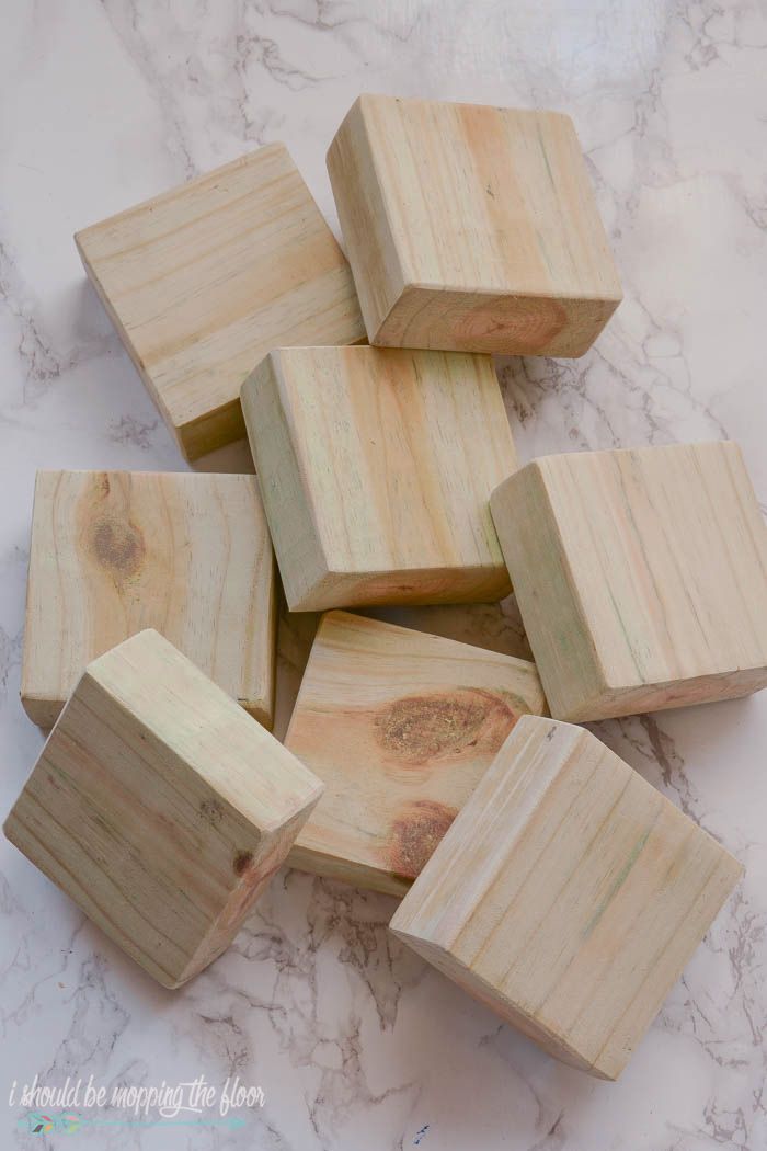 small wooden blocks on a marble counter top