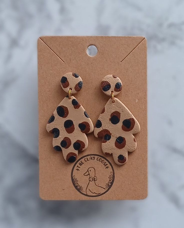 These statement earrings feature a cute leopard print design. Perfect for dressing up or casual wear. These earrings are lightweight, hypoallergenic, and nickel free. 🤍 Trendy Leopard Print Dangle Jewelry, Handmade Leopard Print Earrings, Trendy Leopard Print Dangle Earrings, Trendy Hypoallergenic Brown Earrings, Trendy Hypoallergenic Earrings, Trendy Brown Hypoallergenic Earrings, Leopard Print Drop Earrings Gift, Trendy Leopard Print Earrings As Gift, Leopard Print Earrings For Pierced Ears As Gift