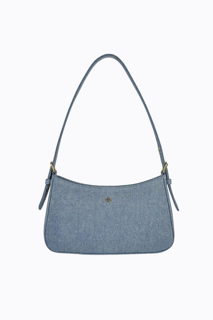 Meet Lilu, where classic chic meets everyday elegance. This bag isn't just an accessory, it's a statement. Trendy Denim Blue Shoulder Bag For Daily Use, Everyday Denim Satchel Bag, Everyday Denim Bags With Zipper Closure, Trendy Denim Bags For Everyday Use, Trendy Everyday Tote Baguette Bag, Trendy Tote Baguette Bag For Everyday, Trendy Denim Blue Shoulder Bag For Everyday, Trendy Everyday Baguette Tote Bag, Denim Blue Bag For Everyday Use