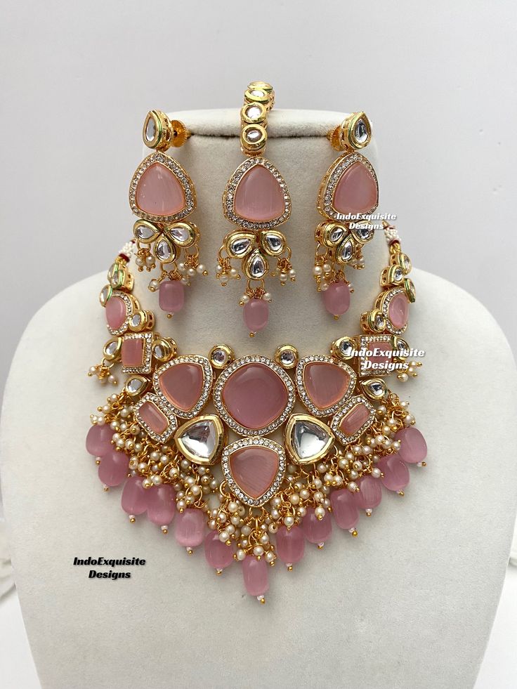 Kundan necklace/choker set comes with beautiful lightweight earrings and tikka/Kundan Polki Necklace/Reception/Wedding/bridal jewelry/ Indian jewelry /Kundan Jewelry/pink  All items are shipped from Brampton, Ontario, Canada. If you need your item by a certain day, please reach out to us for express delivery option before placing the order.  Standard shipping/delivery timeline Below are the delivery timeline estimates. We dispatch all orders by the next business day. ---> USA delivery timeline * Luxury Kundan Ornate Jewelry Sets, Luxury Kundan Necklace With Intricate Design For Reception, Luxury Kundan Jewelry Sets For Ceremonial Occasions, Luxury Kundan Bridal Necklace With Meenakari, Luxury Kundan Jewelry Sets Hallmarked, Luxury Kundan Bridal Necklace For Festive Occasions, Luxury Kundan Wedding Jewelry With Stone Work, Luxury Kundan Sets For Celebrations, Luxury Chandbali Bridal Necklace For Eid