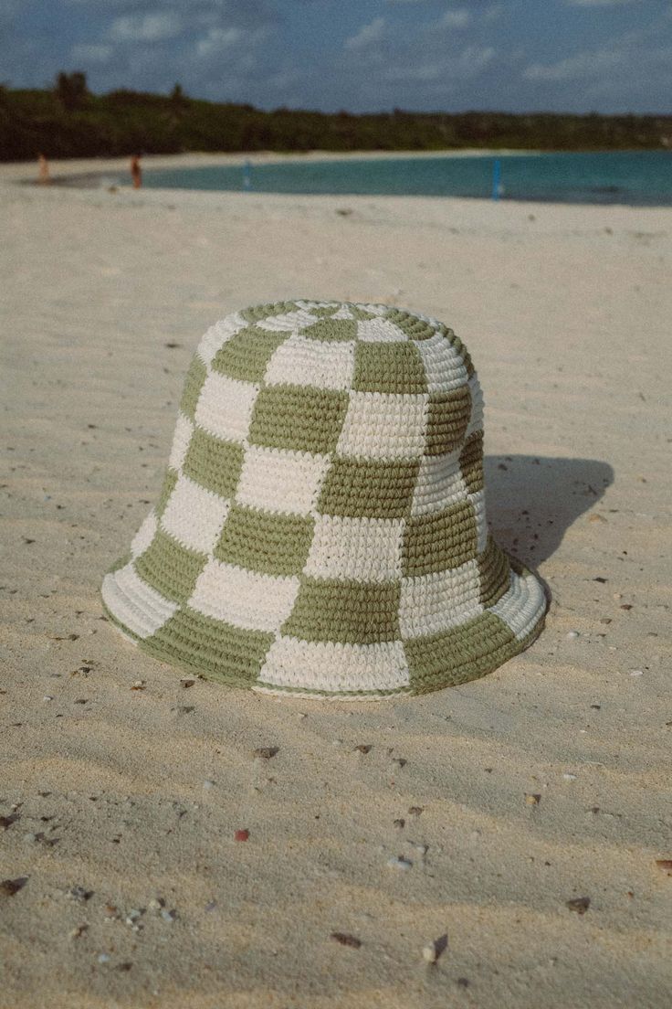 When it comes to cuteness - this hat is a 10. This summer must-have features a playful checkered print and the ability to shape it however you like. Handmade using organic cotton yarn by talented Balinese artisans, each hat takes a full day to create. This is a limited edition item - we've created a limited amount of these and won't be restocking. So get yours now before it's gone for good! Summer Plaid Bucket Hat, Casual Gingham Hats For Summer, Summer Gingham Hat With Curved Brim, Plaid Curved Brim Hat For The Beach, Plaid Curved Brim Hat For Beach, Plaid Hats For Summer Beach, Summer Plaid Brimmed Hat, Plaid Summer Beach Hat, Plaid Bucket Hat For The Beach