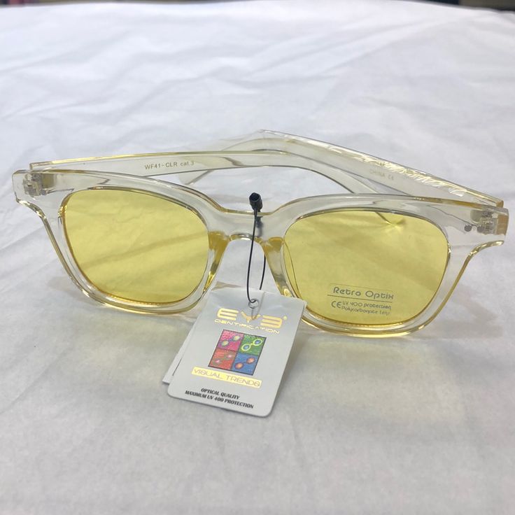 Clear/Yellow Sunglasses Yellow Plastic Sunglasses For Vacation, Yellow Sunglasses With Uv Protection For Vacation, Clear Polarized Sunglasses For Spring, Yellow Plastic Sunglasses For Summer, Spring Clear Polarized Sunglasses, Yellow Plastic Sunglasses For Party, Yellow Casual Sunglasses For Spring, Casual Yellow Sunglasses For Spring, Yellow Plastic Party Sunglasses